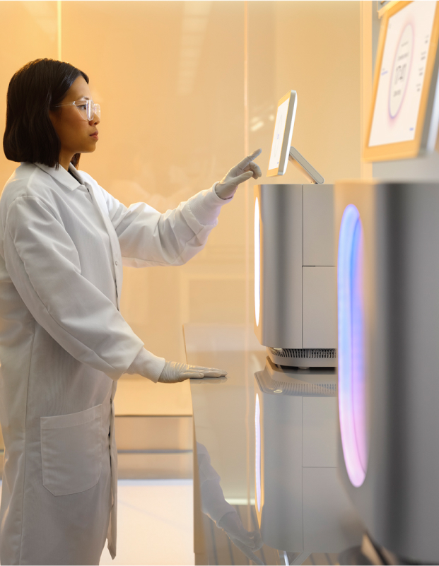 Scientist starting a run on the MiSeq i100 Plus System